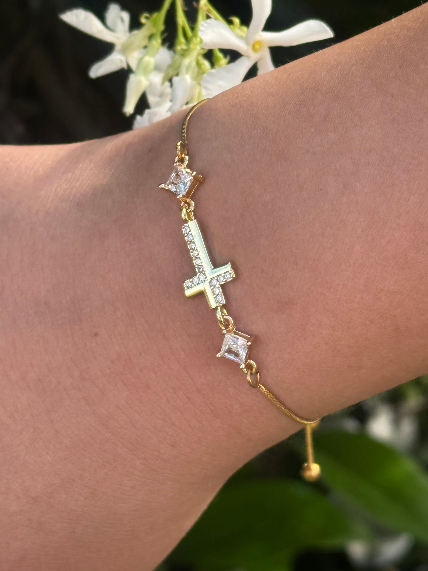 Cubic Zirconia Crystal Gold Plated Cross Bracelet paired with a 14KT Gold Snake Bolo Chain Made in The USA