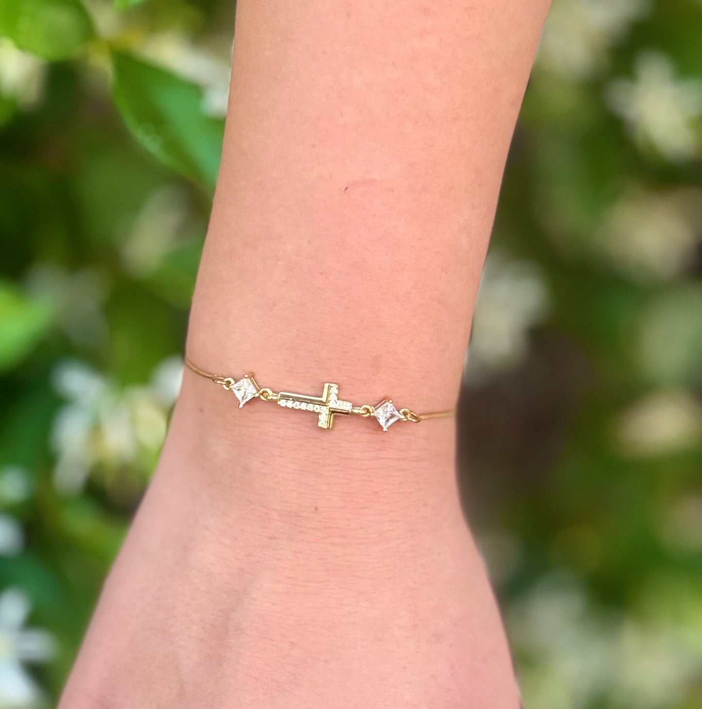Cubic Zirconia Crystal Gold Plated Cross Bracelet paired with a 14KT Gold Snake Bolo Chain Made in The USA