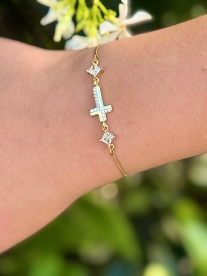Cubic Zirconia Crystal Gold Plated Cross Bracelet paired with a 14KT Gold Snake Bolo Chain Made in The USA