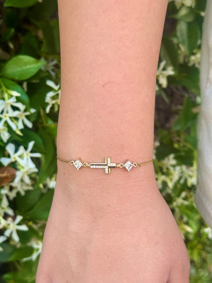 Cubic Zirconia Crystal Gold Plated Cross Bracelet paired with a 14KT Gold Snake Bolo Chain Made in The USA